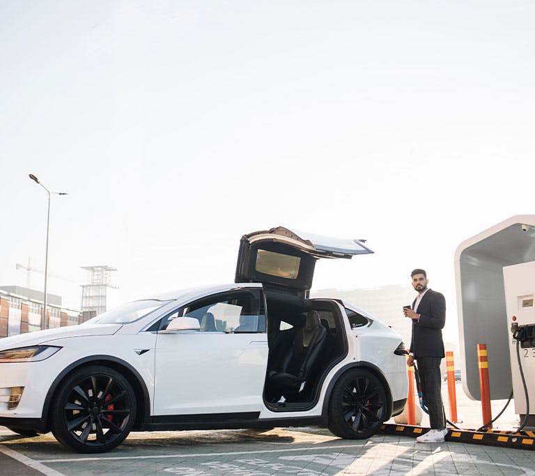 Man charging EV