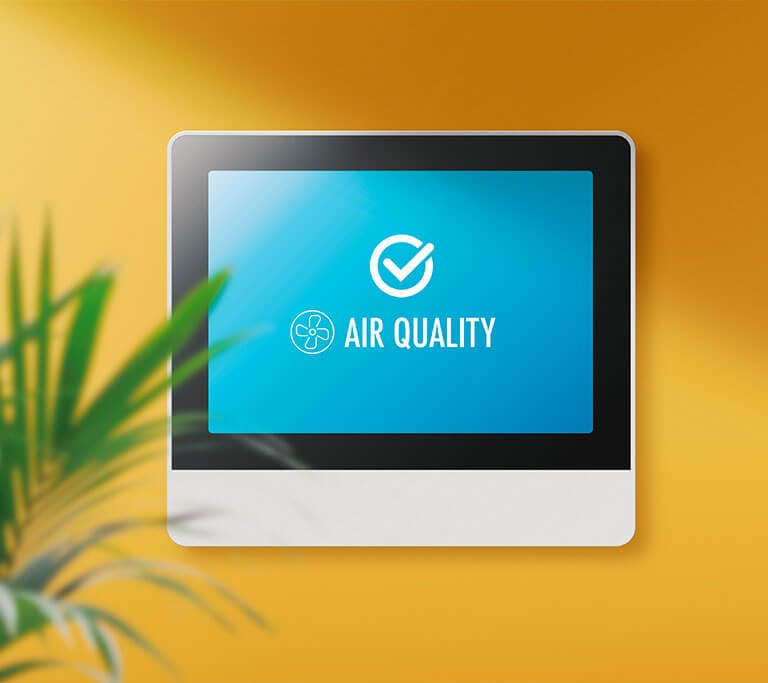Air quality monitor on wall
