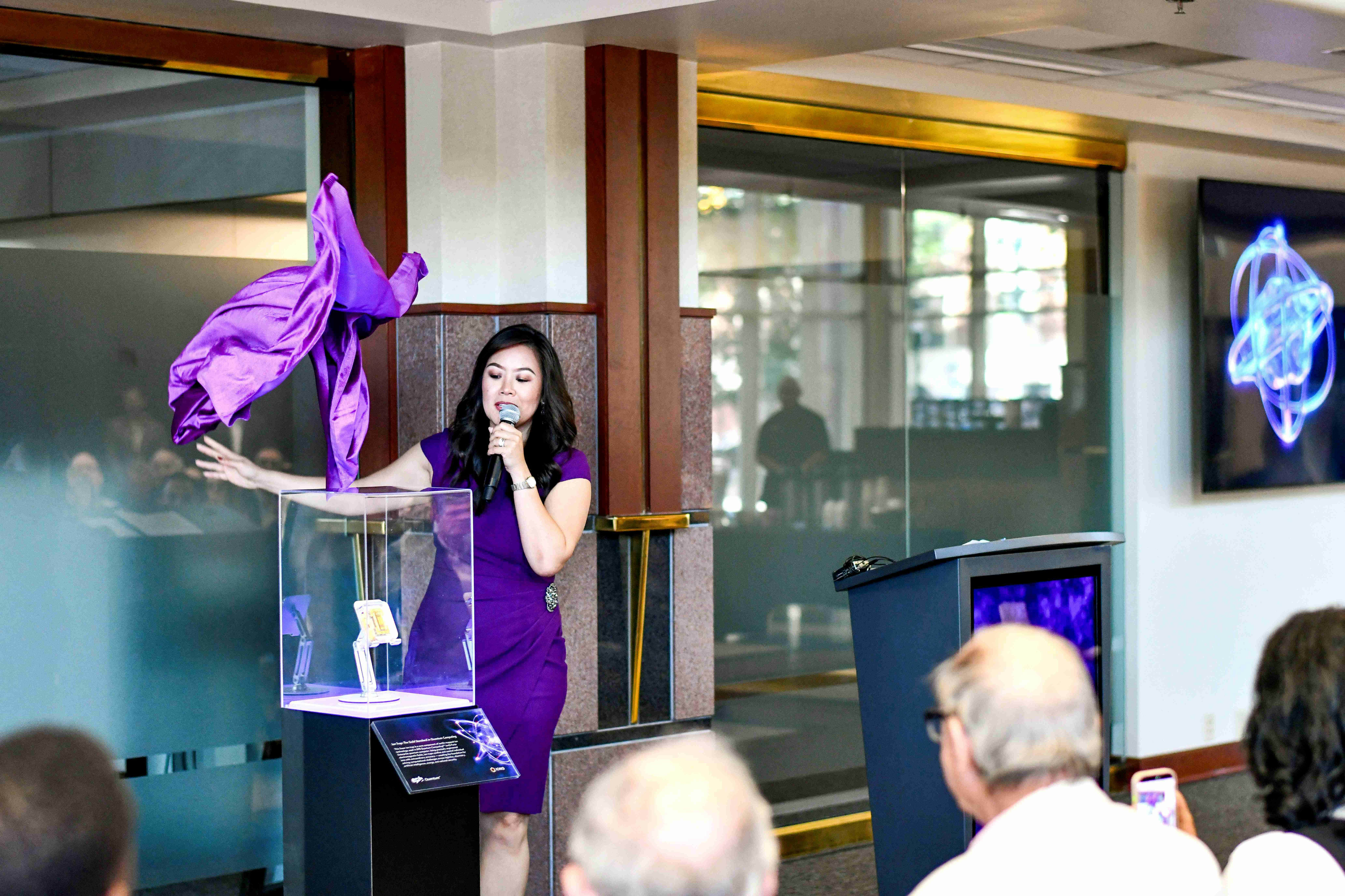 EPB CEO Janet Rehberg unveils IonQ's ion trap at the press conference to announce the launch of EPB Quantum Computing