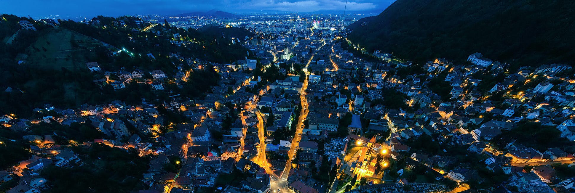 aerial-drone-view-of-brasov-at-night-romania-2025-02-19-21-34-23-utc (1).jpg