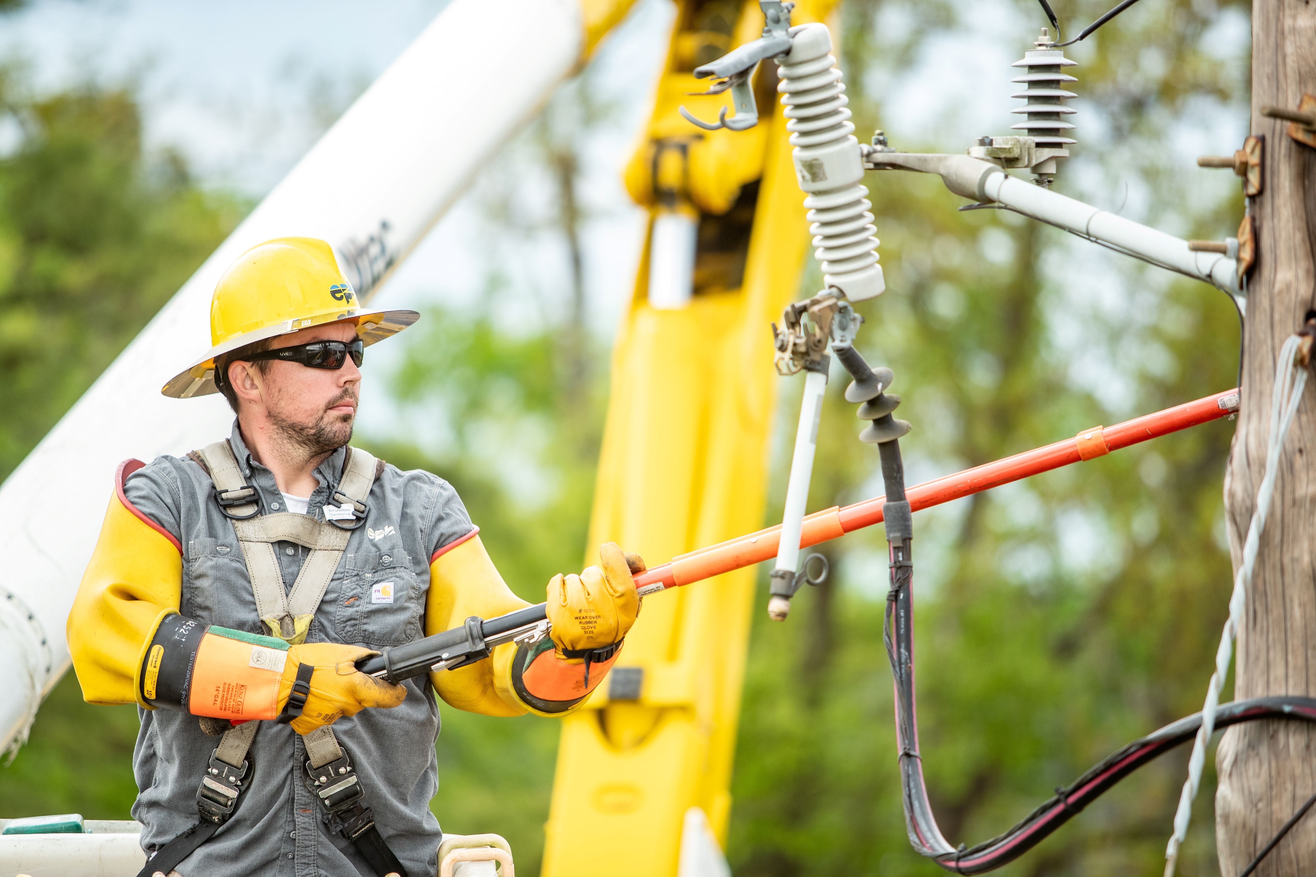 EPB lineman with pole