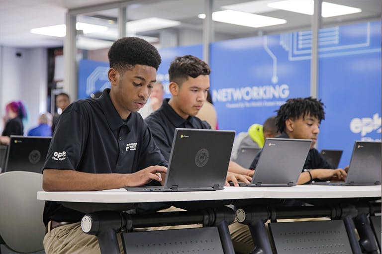 Students of EPB Institute of Technology at Tyner Academy use their computers at the new learning laboratory.