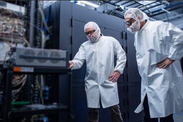 EPB team members with quantum computer