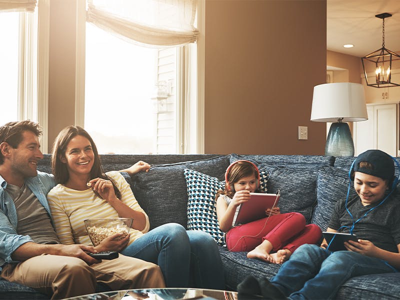 Family streaming movies, doing school work and using devices