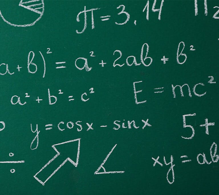 Equations on chalkboard