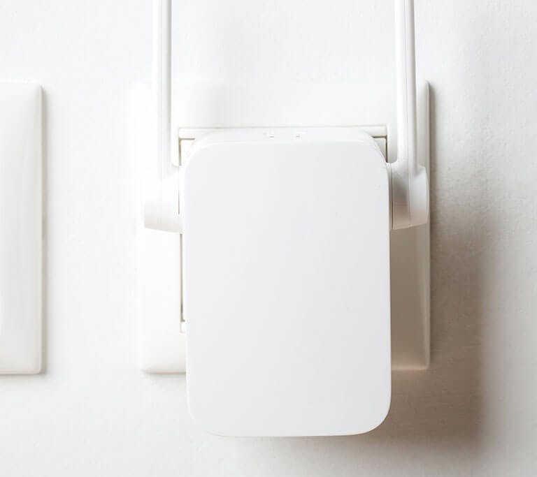 Wifi node plugged into wall outlet.