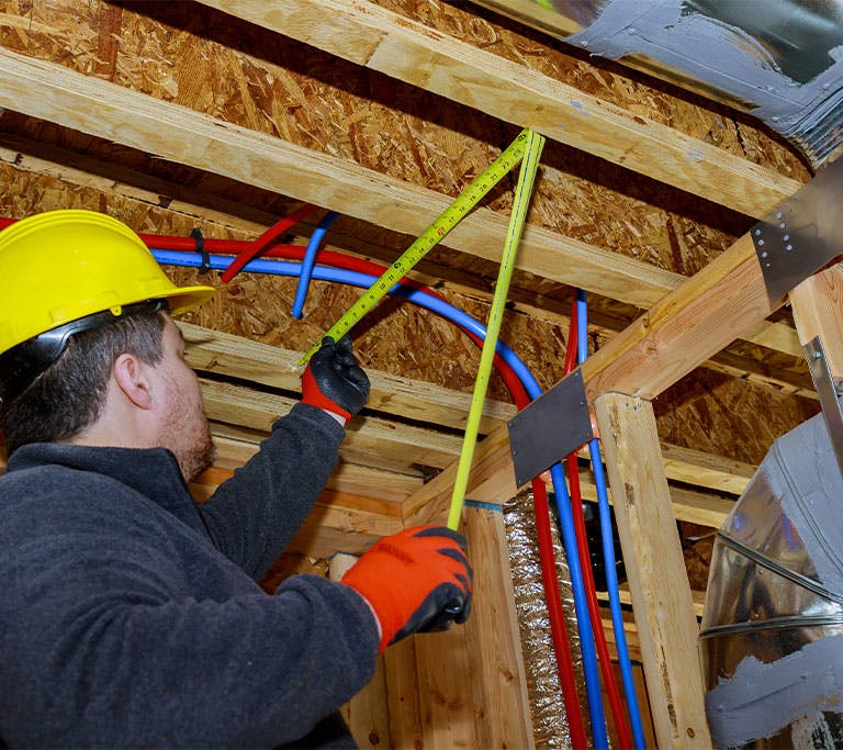 Measuring in attic for insullation